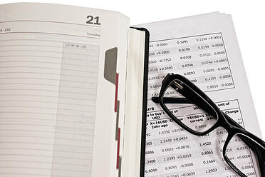 photodune-736650-glasses-and-financial-documents-xs2