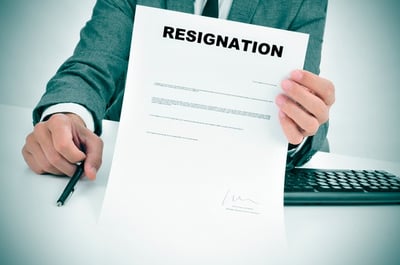 photodune-9724411-man-in-suit-showing-a-figured-signed-resignation-document-xs_2.jpg
