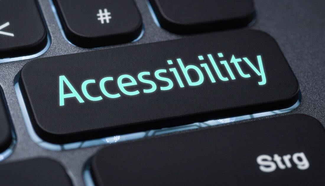 Keyboard key labeled 'Accessibility' representing digital accessibility and AODA compliance in document management.